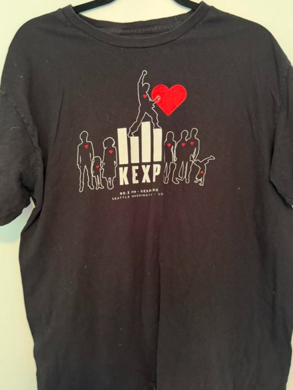 Black KEXP Seattle radio station tee with white silhouettes graphic, size XL